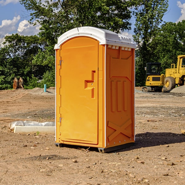 what is the cost difference between standard and deluxe portable toilet rentals in Modale